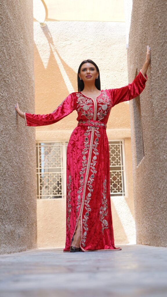 Hand-embroidered red kaftan, made from luxurious velvet, featuring delicate crystal embroidery. Ideal for formal occasions, weddings, and elegant evening wear.
