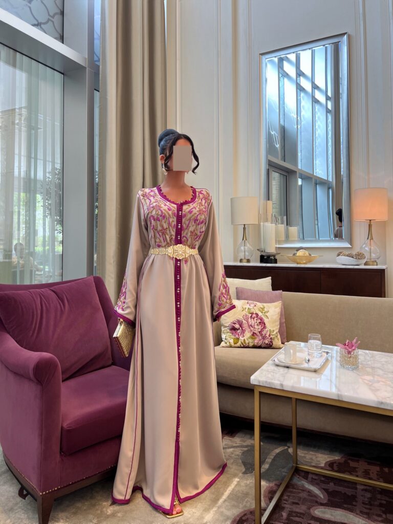 Elegant Hand Embroidered Crystal Kaftan, crafted from premium crepe fabric with shimmering crystal embellishments. Includes two belts (metal and rope) for versatile styling. Ideal for formal events, weddings, and luxury fashion.